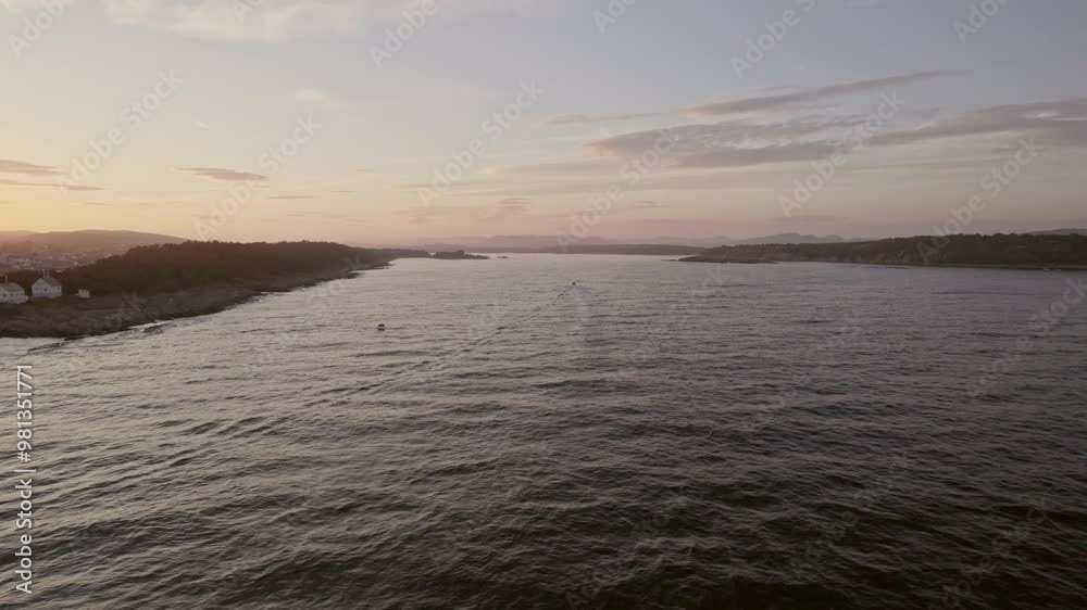 Tranquil Sunset On Norwegian Coastal Waters And Islands Tranquil Sunset On Norwegian Coastal Waters And Islands