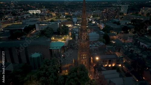 Coventry cathedral illuminating night skyline
