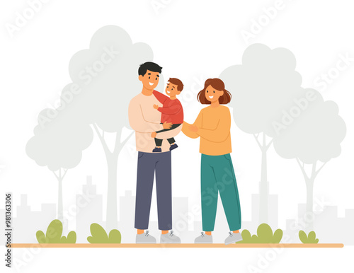 Happy family with their son walking outdoors at the park. International family day