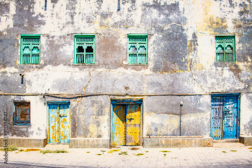 Fototapeta Naklejka Na Ścianę i Meble -  Old windows and doors in Mirbat, Oman.