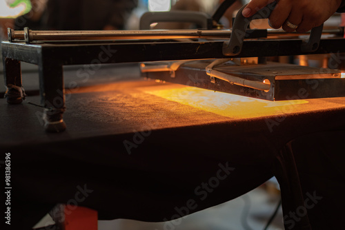 Quadro em tela Black shirt is burned with curing or conveyor machine