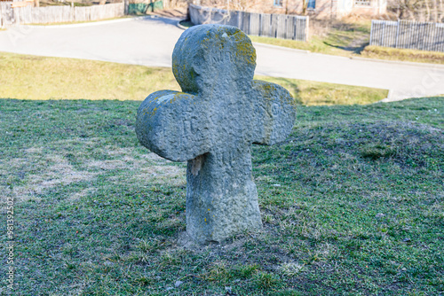 Ancient cross at the yard of Saint Elias Church in village Subotiv. Cossack burial photo