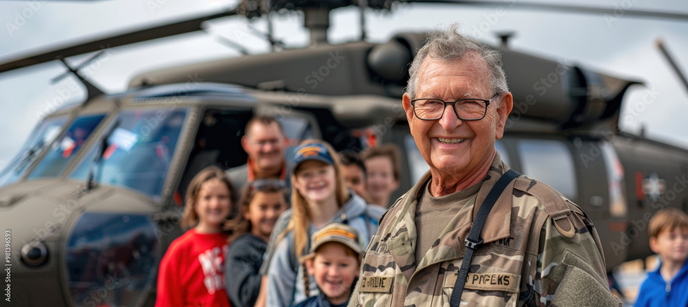 Veteran with Proud Family at Veterans Day Airshow in Front of Military Helicopter Veteran with Proud Family at Veterans Day Airshow in Front of Military Helicopter