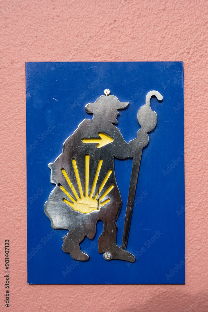 Sign for El camino de Santiago in a wall
