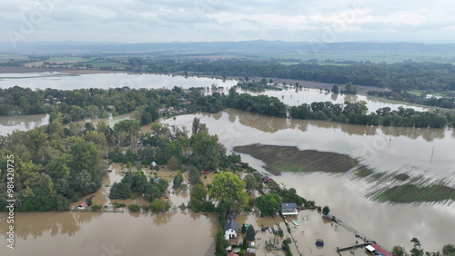 Valokuva Flooded house river flood drone aerial after water consequences damaged raging b