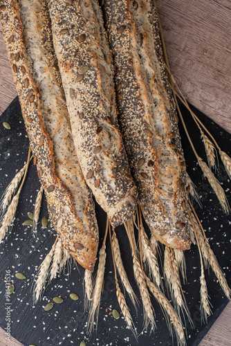 Obraz na płótnie Three whole grain baguette from above w salonie
