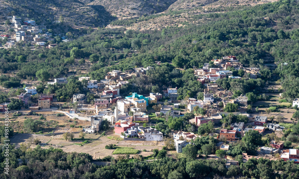 Imouzzer Ida Ou Tanane, Morocco : cityscape of Imouzzer, with mountains in the background. Imouzzer Ida Ou Tanane, Morocco : cityscape of Imouzzer, with mountains in the background.