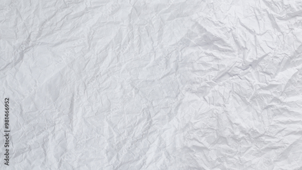 Obraz premium Crumpled white paper background.