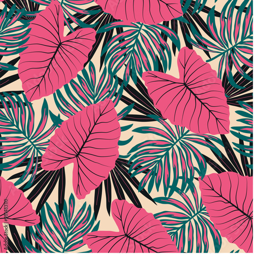 Abstract seamless tropical pattern with bright plants and leaves on a beige background. Seamless pattern with colorful leaves and plants. Tropic leaves in bright colors. Exotic wallpaper.