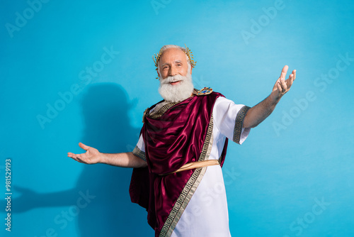 Εκτύπωση καμβά Photo of powerful mature man excited stretch hands welcome wear ancient roman em