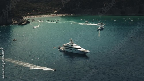Wallpaper Mural Summer Aerial Panorama of Luxury Megayachts and Tourists at Cala Luna Bay, Sardinia Torontodigital.ca