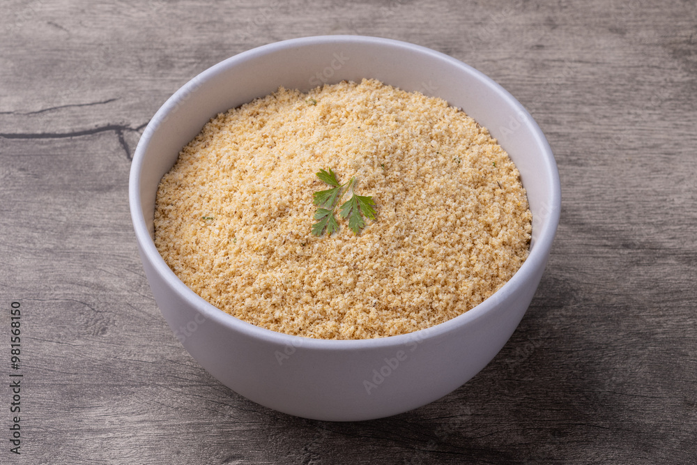 Farofa, typical brazilian manioc flour side dish over wooden table Farofa, typical brazilian manioc flour side dish over wooden table