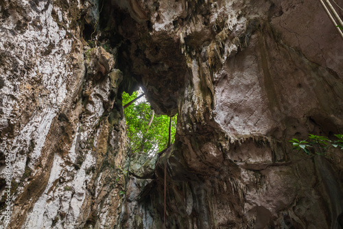 Landscape photo with a cave in rocks. National park Los Haitises. Samana photo