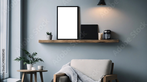 Minimalist, cozy living room corner with modern wooden furniture, armchair, potted plant and decorative empty transparent frame highlighting a calm and neutral-toned interior  photo