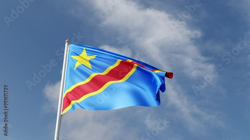 Flag of democratic republic of congo on a blue sky, flag on a flag pole waving in the wind, african country, national symbol of Congo, video of a flag	
