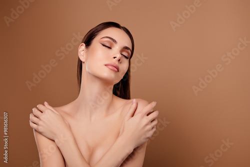 Принти на полотні Photo of tempting dreamy lady wear nothing embracing herself close eyes emtpy sp