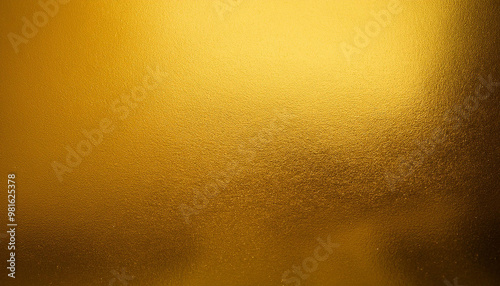Golden texture background with a grainy gradient and a slight sparkle. Perfect for use as a background, wallpaper, or design element.