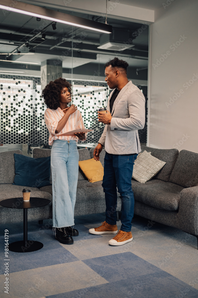 Portrait of diverse entrepreneurs collaborating on a project at office. Portrait of diverse entrepreneurs collaborating on a project at office.