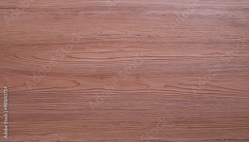 Close-up of a textured wooden surface with a natural brown color.