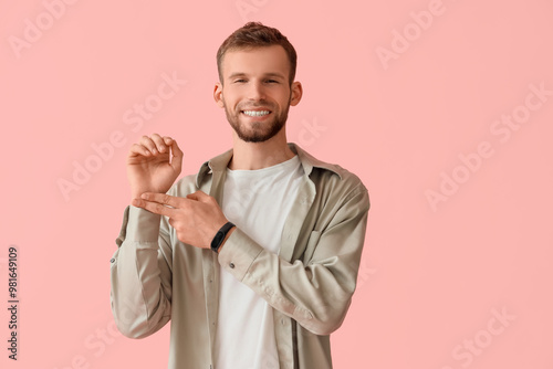 Young man checking his puls...