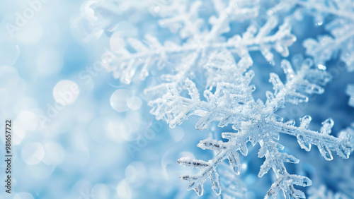 Close-up of a frosty snowflake with a festive glowing effect