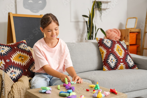 little girl sculpting from ...