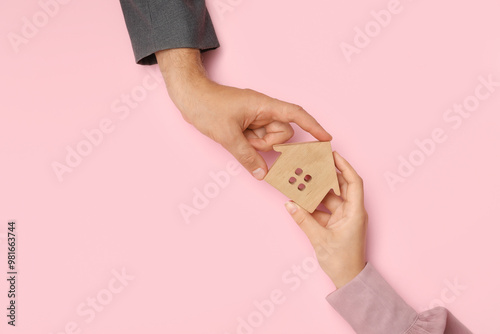 Couple with house figure on...