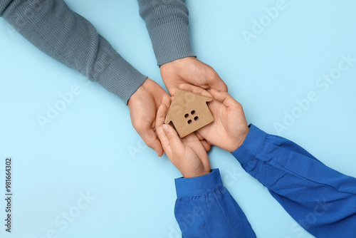 Couple with house figure on...