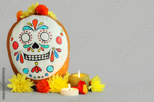 Pumpkin with painted skull,...