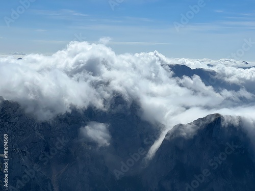 Picturesque and beautiful clouds over the Julian Alps, Strmec na Predelu (Triglav National Park, Slovenia) - Malerische und schöne Wolken über den Julischen Alpen (Triglav-Nationalpark, Slowenien) photo