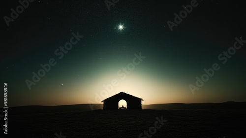 Nativity. Silhouette of a stable in the desert with starry sky and bright comet. photo