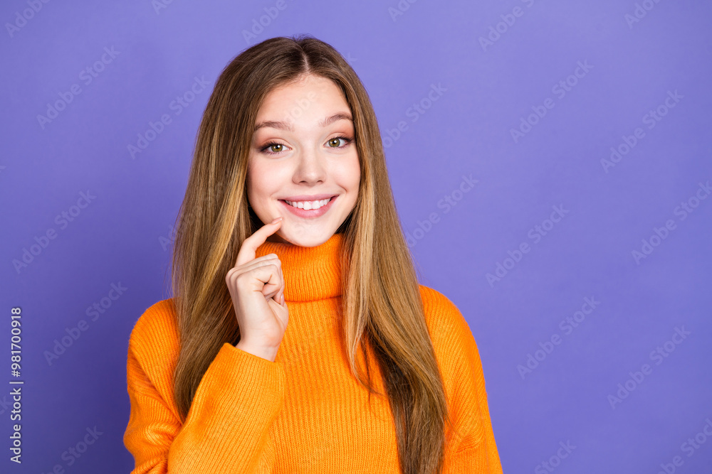 Portrait photo of youth charming blonde hair cute happy smile girl touch chin brainstorming isolated on violet color background Portrait photo of youth charming blonde hair cute happy smile girl touch chin brainstorming isolated on violet color background