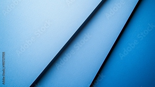 Abstract blue background with diagonal lines and textured surface.