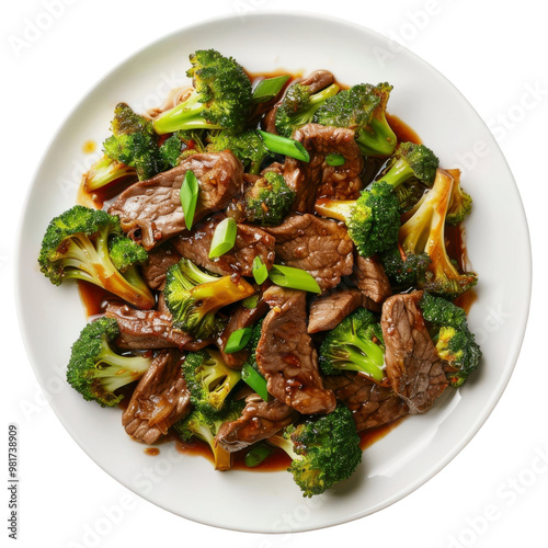 A plate of beef and broccoli stir fry with a savory sauce and garnished with chopped green onions.