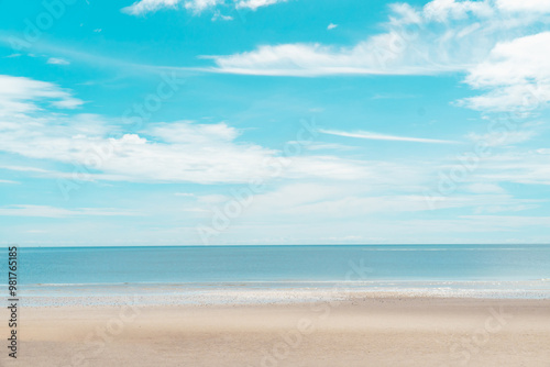 Ocean wave beach on summer with blue sky photo