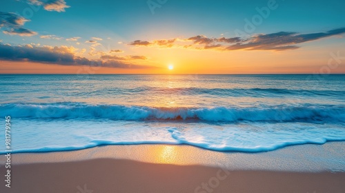 Serene beach sunset with gentle waves and