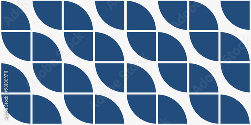 A pattern of raised blue shapes folded into a diagonal pattern.