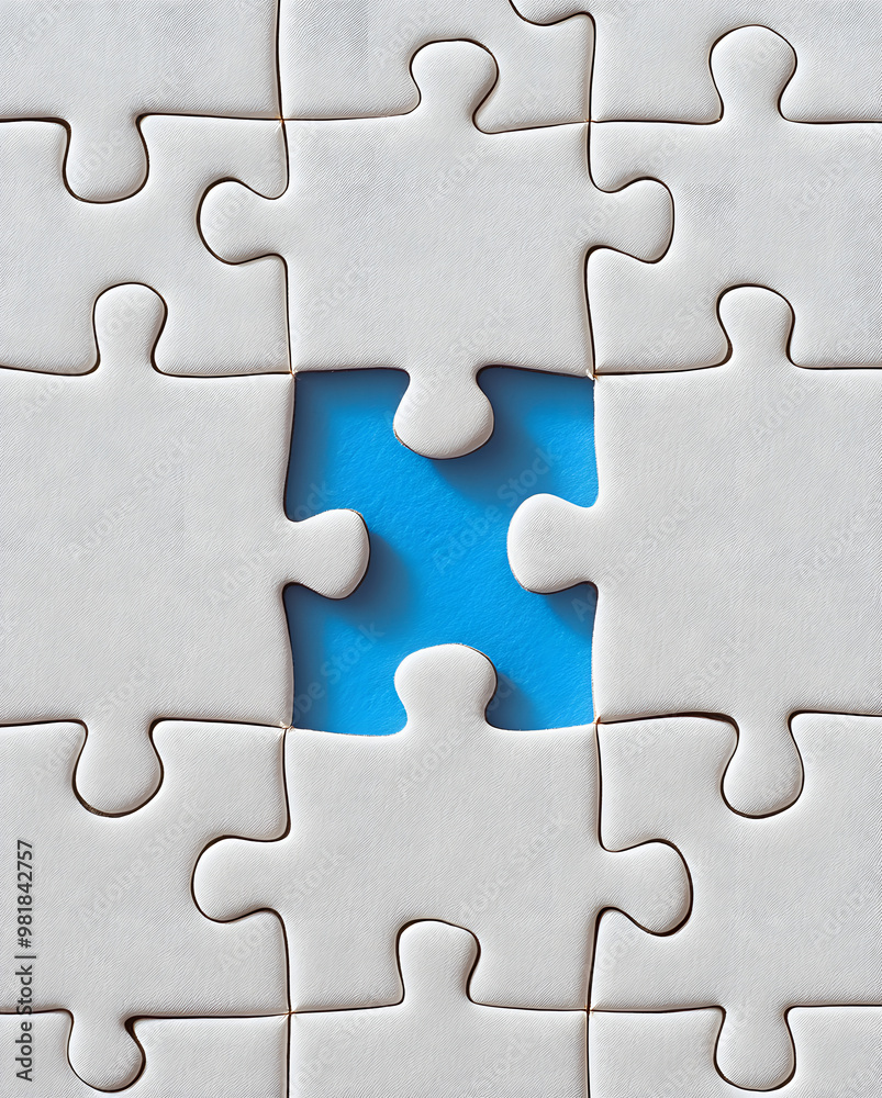 White Puzzle with One Missing Piece Revealing a Bright Blue Background
