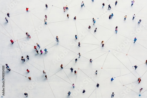 Aerial view of people connected by lines on a white surface.