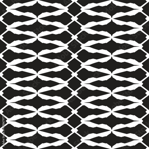 A repetitive pattern of white shapes on a black background, creating a visually striking design.