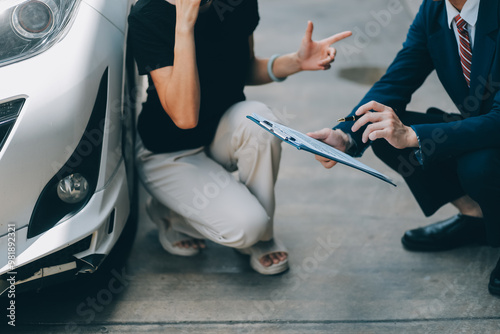 A young businesswoman is navigating car insurance options at her desk, considering premiums, deductibles, and coverage while understanding policies and managing claims efficiently.