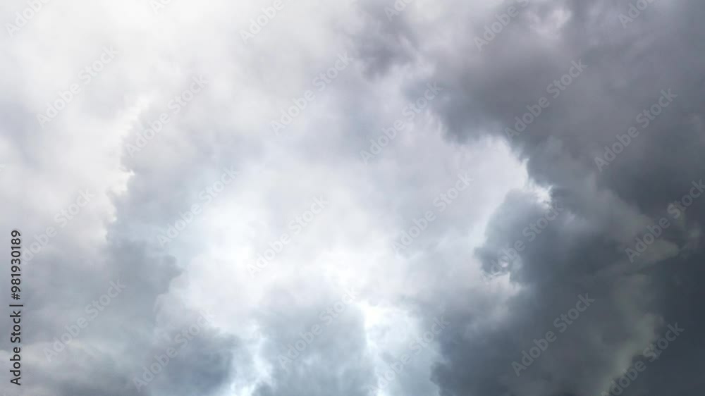flying near a thunderstorm, thick clouds in the sky. flying near a thunderstorm, thick clouds in the sky.