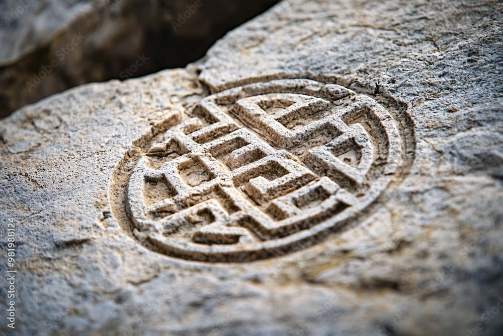 An elaborate emblem of wisdom etched into timeless stone embodies the fusion of art and historical insight in a striking image. An elaborate emblem of wisdom etched into timeless stone embodies the fusion of art and historical insight in a striking image.