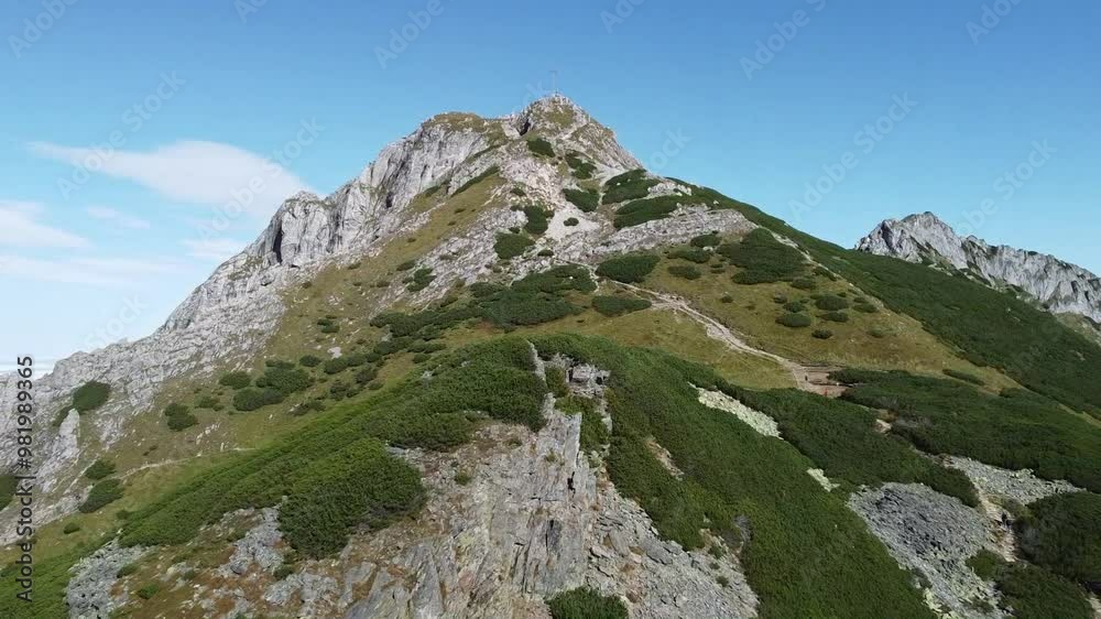 Zooming out aerial view at Giewont, Tatry mountains, Poland, summertime Zooming out aerial view at Giewont, Tatry mountains, Poland, summertime