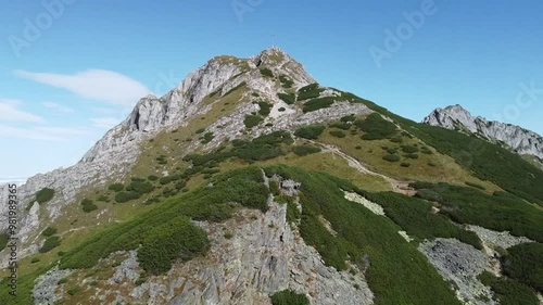 Zooming out aerial view at Giewont, Tatry mountains, Poland, summertime