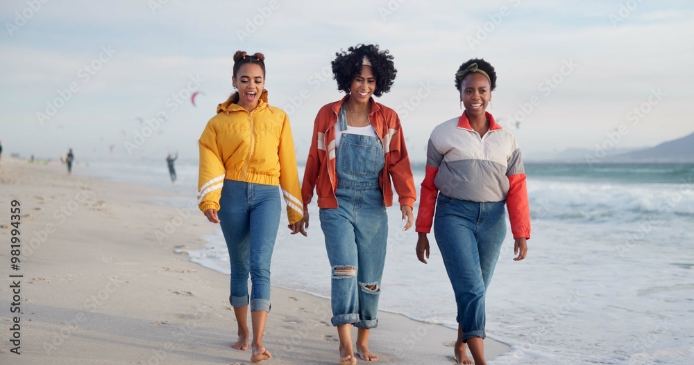 Fototapeta premium Happy women, walking and holding hands with friends on beach for holiday, weekend or strolling in nature. Young, female person or group with smile for outdoor vacation or social by ocean coast