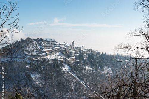Sacro Monte di Varese (Santa Maria del Monte), Italy. Winter view with snow. World Heritage Site – Unesco. The funicular route is visible at the bottom and center of the photo