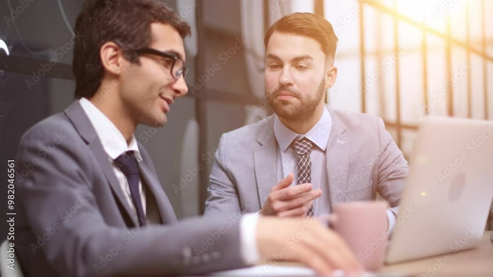 Learning from experience. Cropped shot of two corporate business colleagues having a meeting around the table in the boardroom.