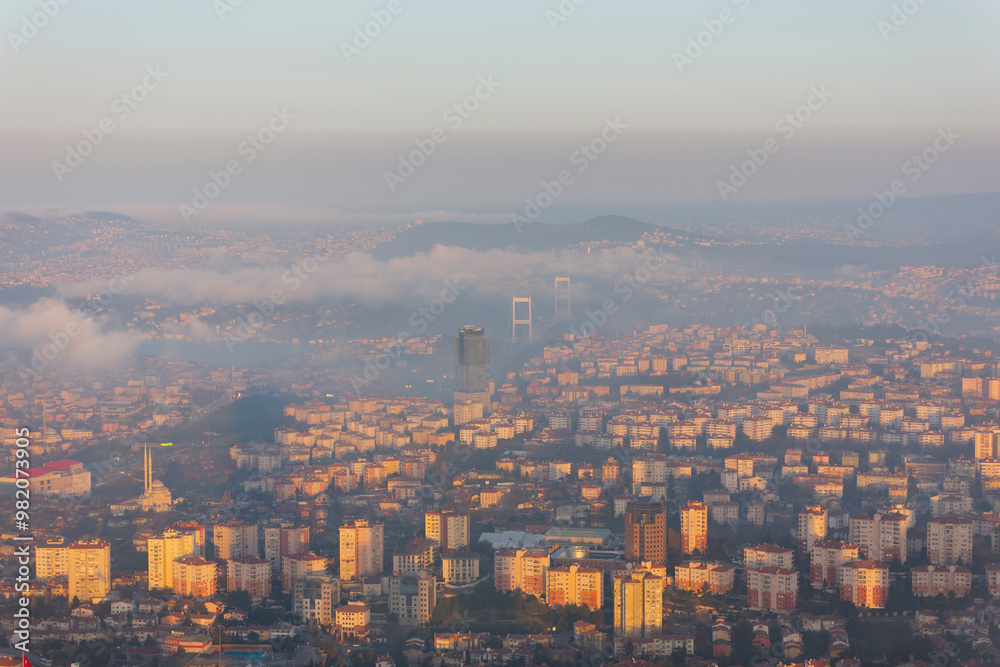 Skyscraper and bridge in Istanbul in foggy weather Skyscraper and bridge in Istanbul in foggy weather