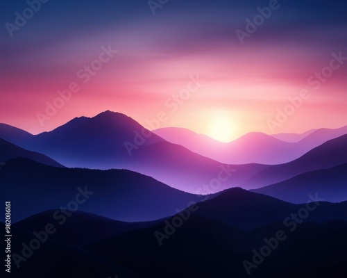 Stunning sunrise over purple mountain ranges, casting a serene atmosphere with soft gradients in the sky and gentle silhouettes.